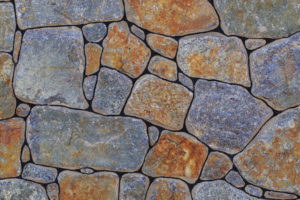 a close up of rockwall construction