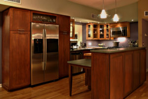 a beautifully modern kitchen with stainless steel appliances